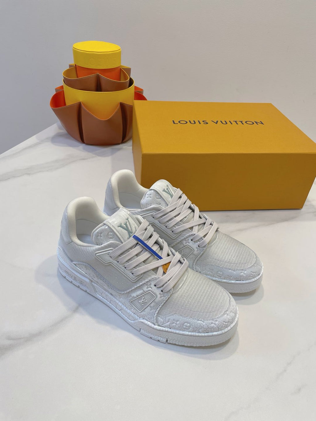 LOUIS VUITTON LV TRAINER MAXI SNEAKER IN WHITE EMBOSSED CALFSKIN