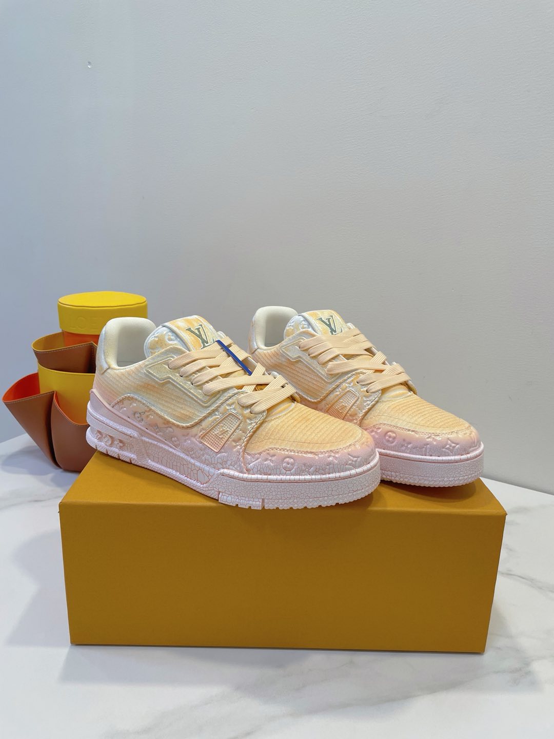 LOUIS VUITTON LV TRAINER MAXI SNEAKER IN LIGHT PINK OMBRE ORANGE EMBOSSED CALFSKIN