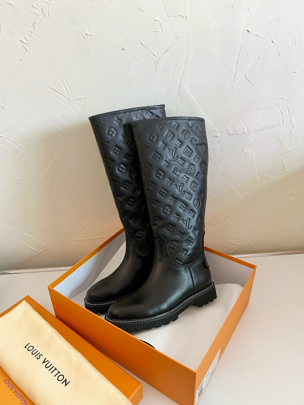 LOUIS VUITTON TERRITORY FLAT HIGH BOOT IN BLACK EMBOSSED CALFSKIN