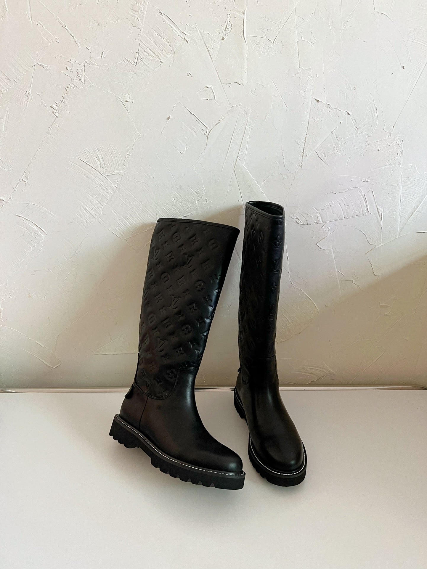 LOUIS VUITTON TERRITORY FLAT HIGH BOOT IN BLACK EMBOSSED CALFSKIN