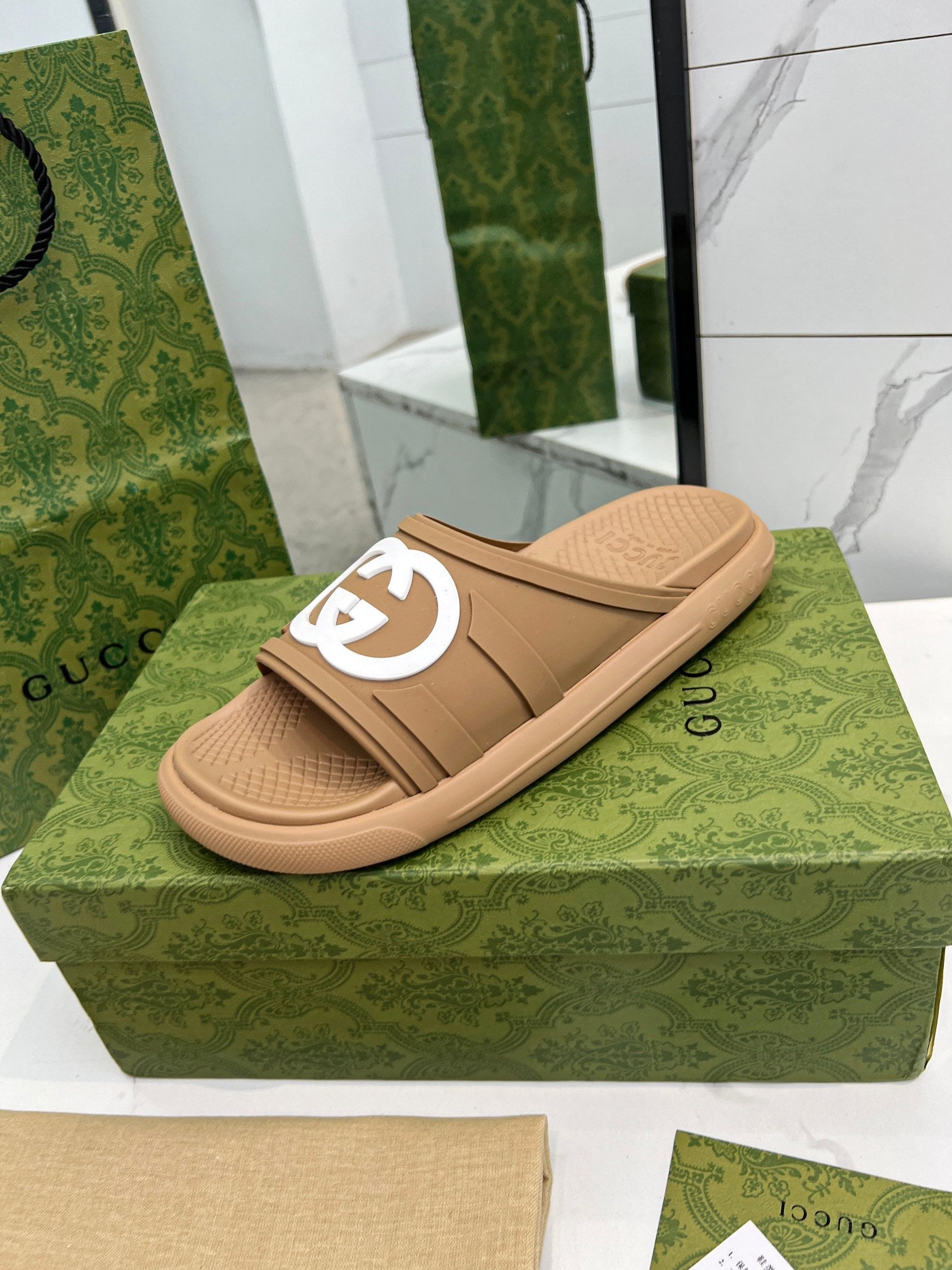 GUCCI PLATFORM SLIPPERS IN PEANUT BROWN IMPORTED TPU