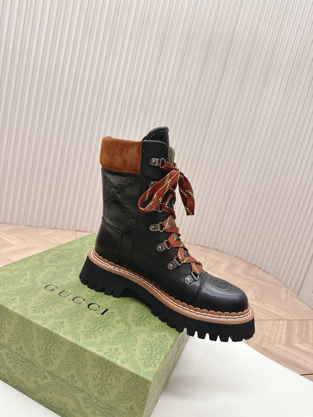 GUCCI MARTIN ANKLE BOOTS IN BLACK EMBOSSED CALFSKIN MIX BROWN SUEDE