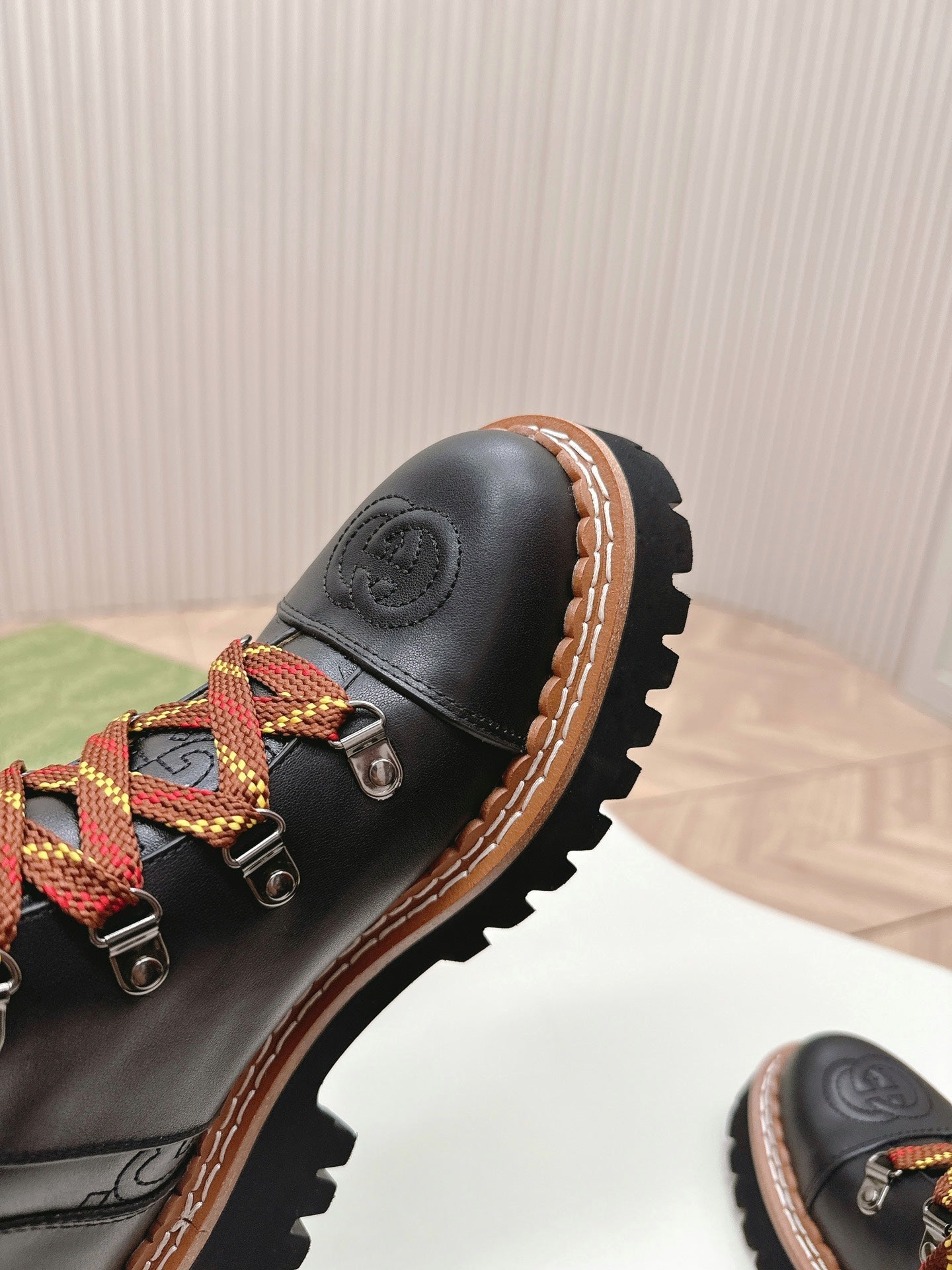 GUCCI MARTIN ANKLE BOOTS IN BLACK EMBOSSED CALFSKIN MIX BROWN SUEDE