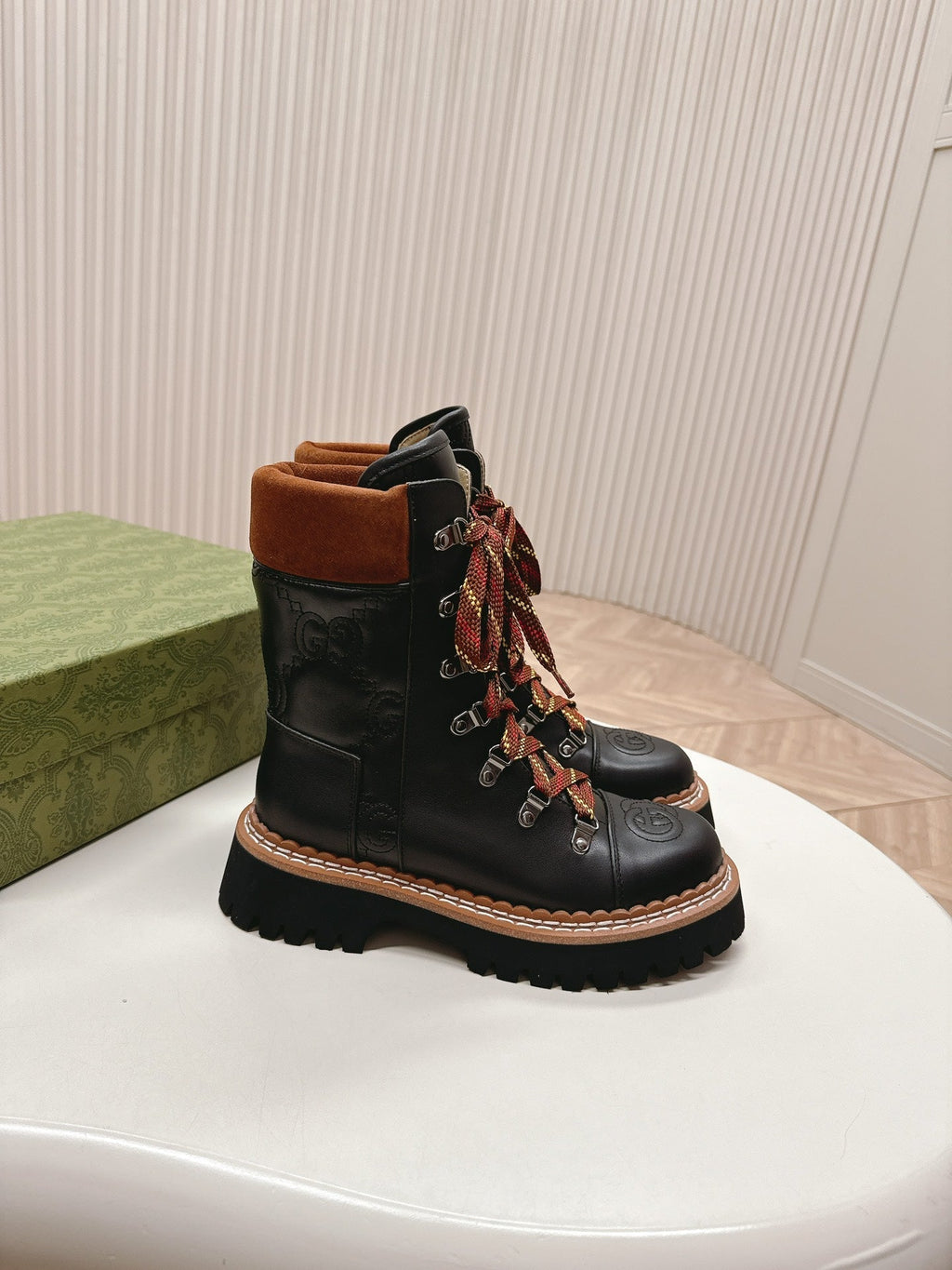 GUCCI MARTIN ANKLE BOOTS IN BLACK EMBOSSED CALFSKIN MIX BROWN SUEDE