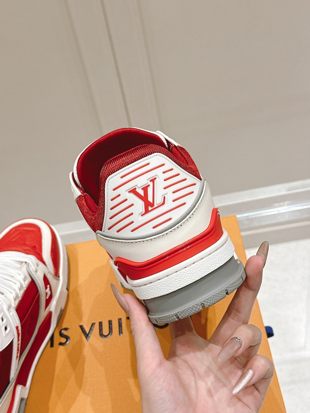 LOUIS VUITTON LV TRAINER SNEAKER IN SARI RED GRAINED CALFSKIN