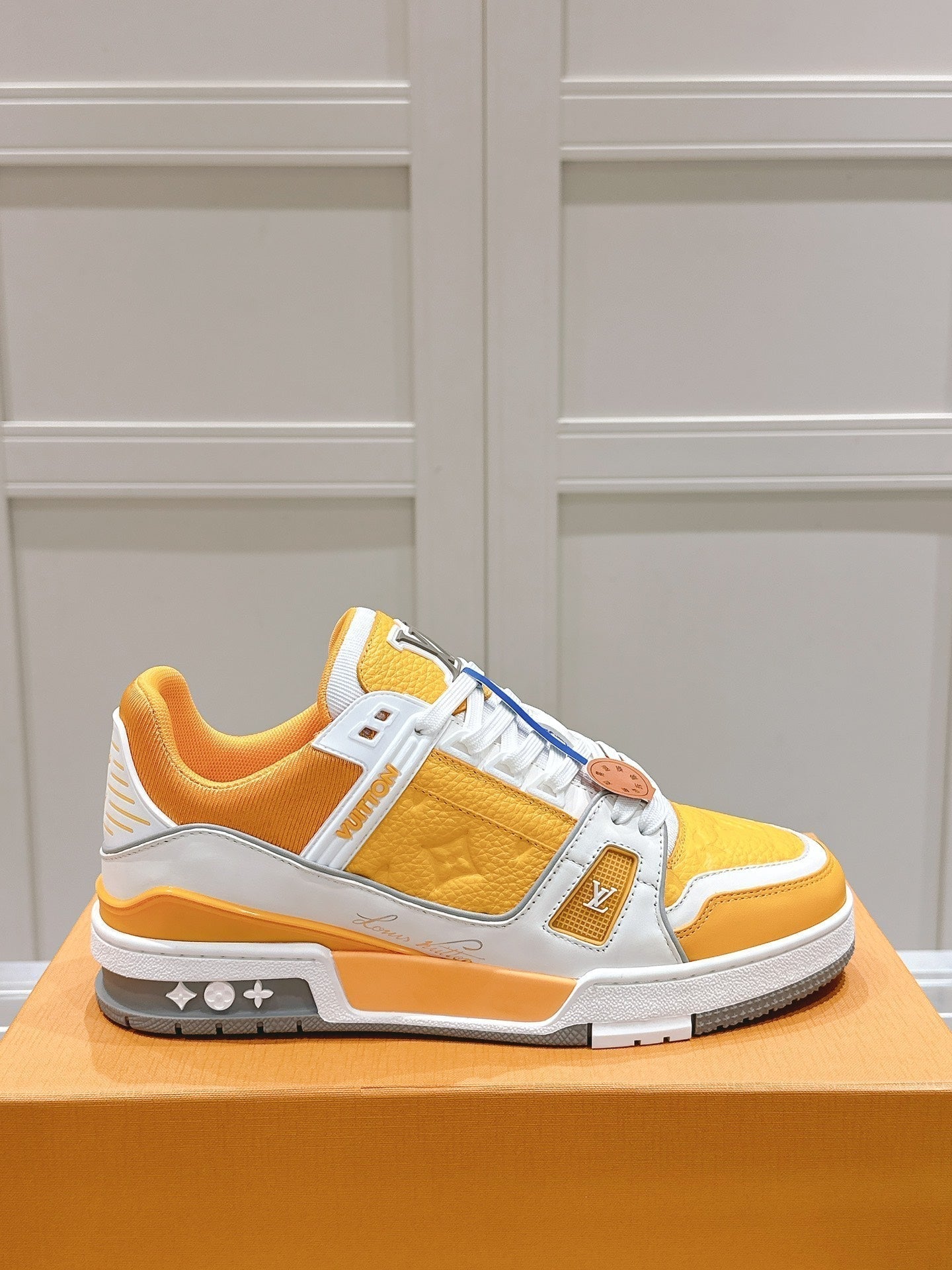 LOUIS VUITTON LV TRAINER SNEAKER IN SAFFRAN YELLOW GRAINED CALFSKIN