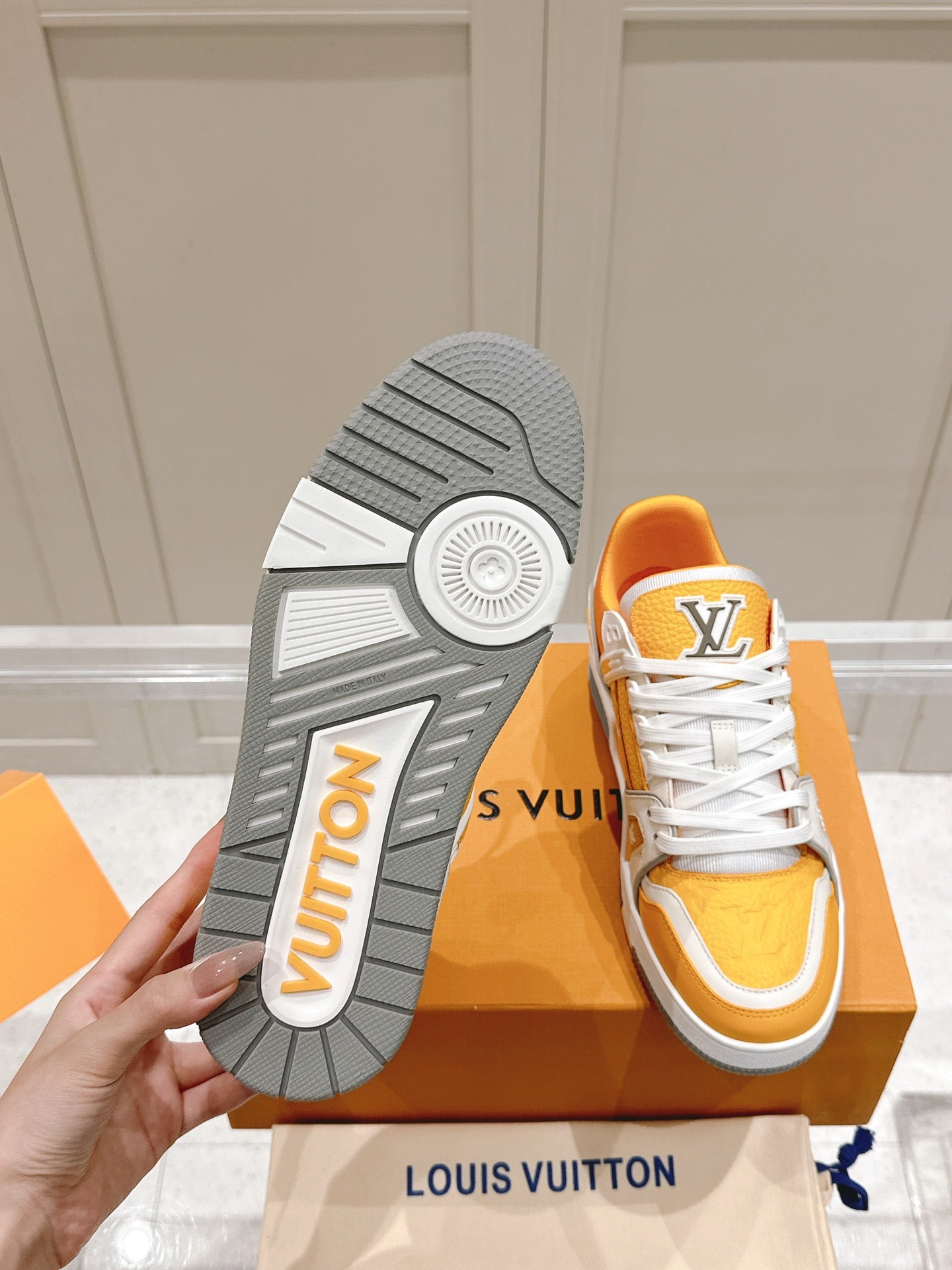LOUIS VUITTON LV TRAINER SNEAKER IN SAFFRAN YELLOW GRAINED CALFSKIN