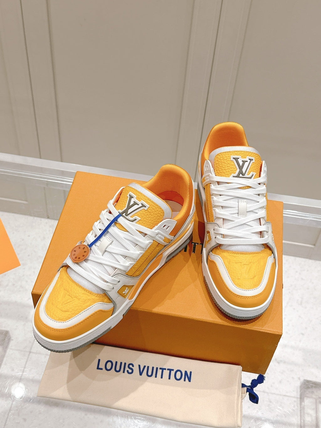 LOUIS VUITTON LV TRAINER SNEAKER IN SAFFRAN YELLOW GRAINED CALFSKIN