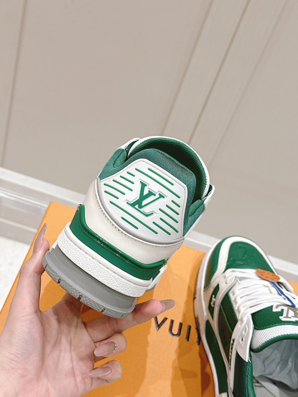 LOUIS VUITTON LV TRAINER SNEAKER IN BORNEO GREEN GRAINED CALFSKIN