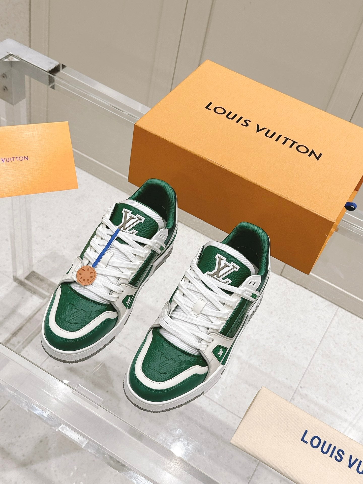 LOUIS VUITTON LV TRAINER SNEAKER IN BORNEO GREEN GRAINED CALFSKIN