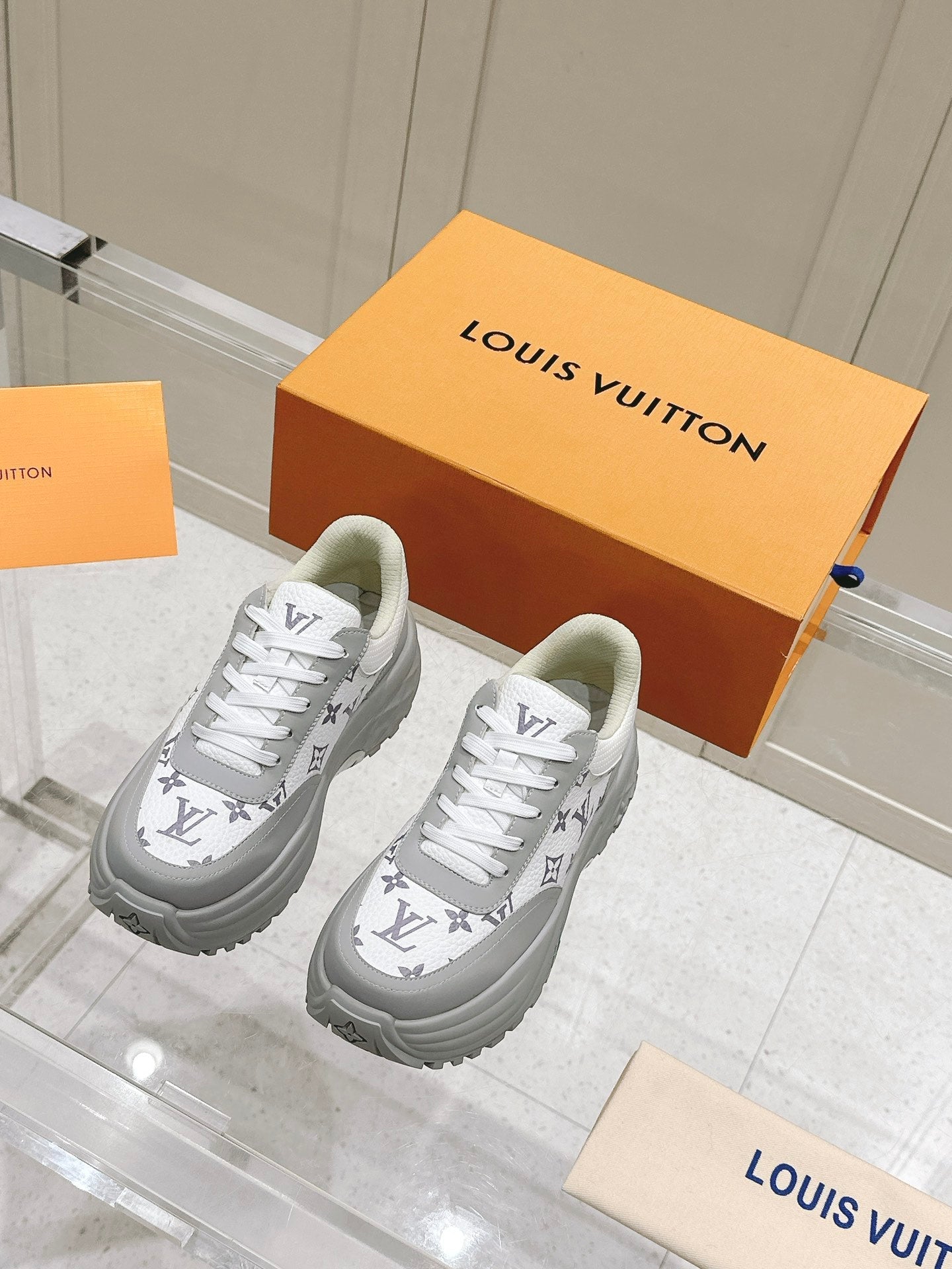 LOUIS VUITTON RUN AWAY SNEAKER IN DOVE GRAY MIX WHITE CALFSKIN