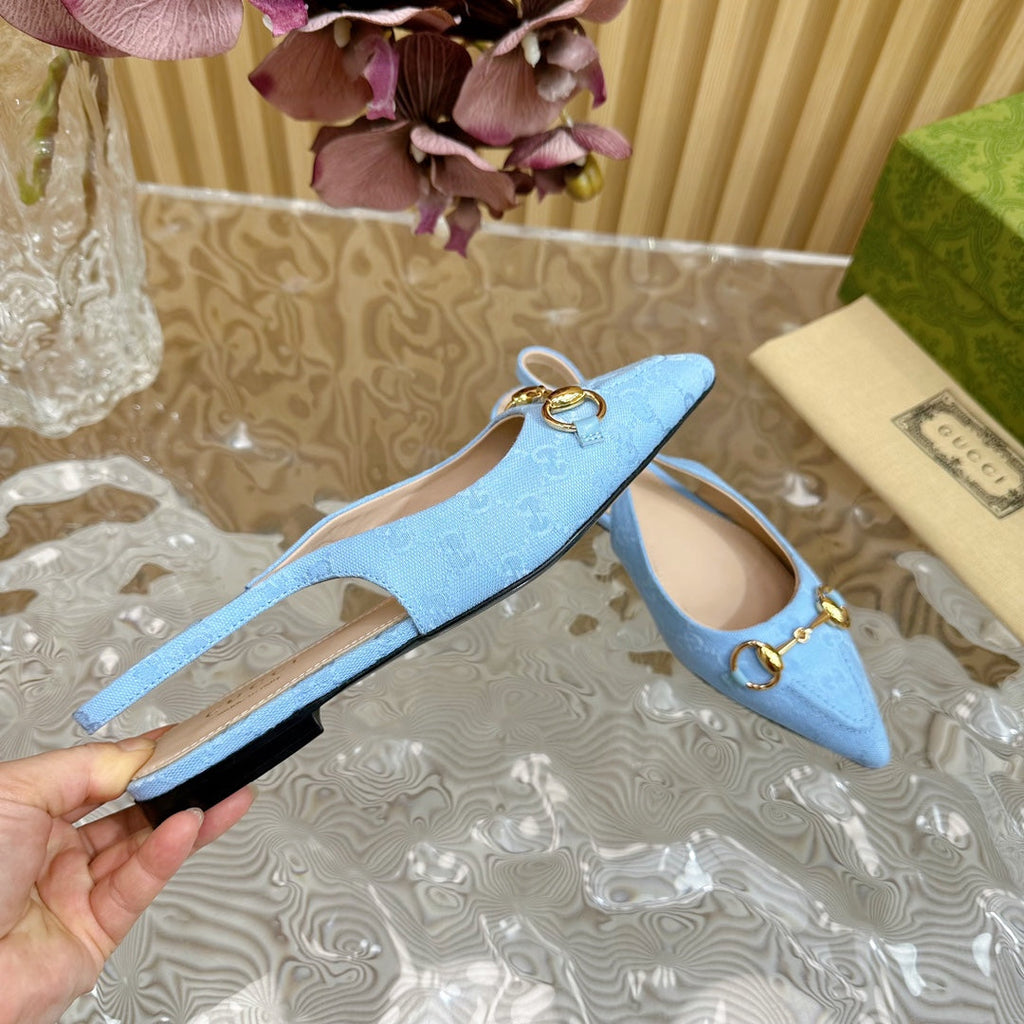 GUCCI WOMEN'S SLIDE SANDAL WITH CROSS SKY CANVAS