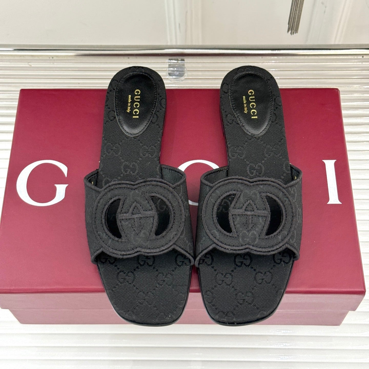 GUCCI SLIDE SANDALS IN BLACK FABRIC EMBOSSED LOGO STYLE 1