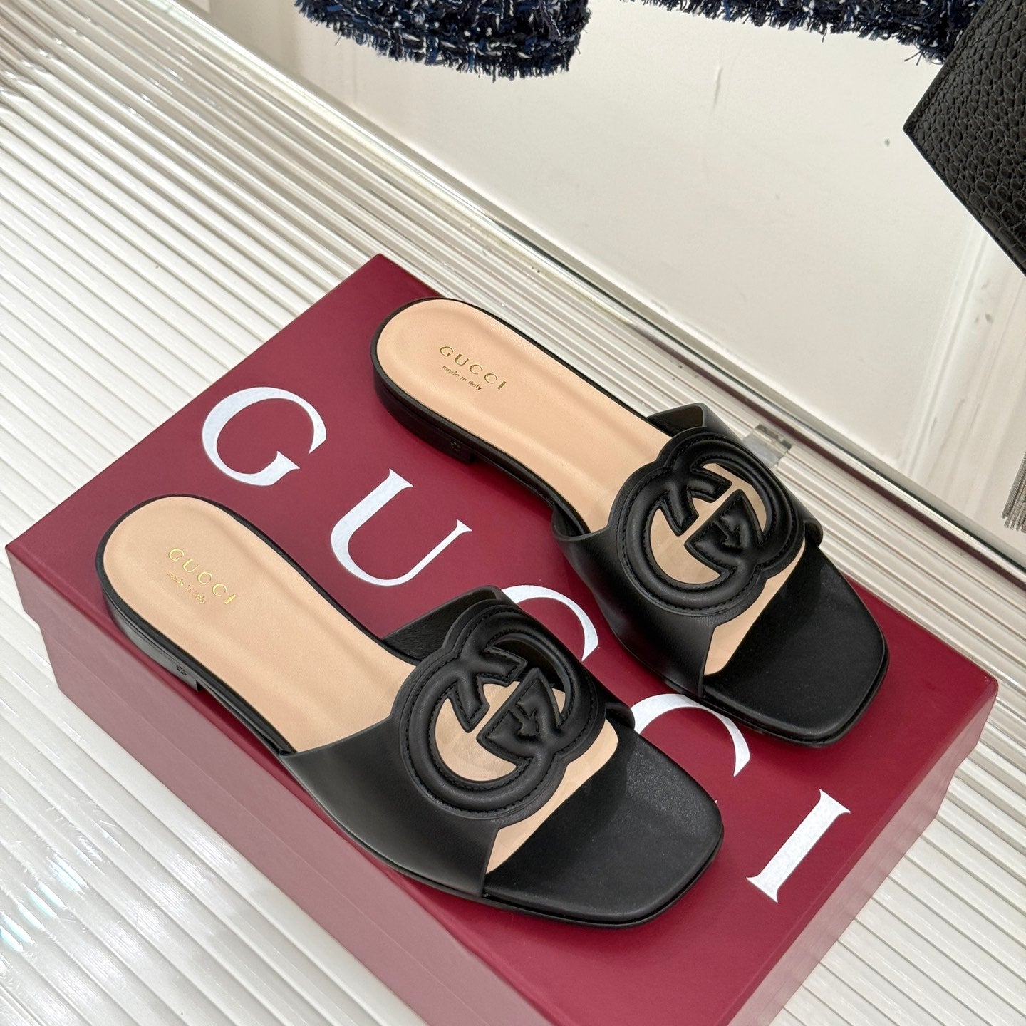 GUCCI SLIDE SANDALS IN BURNT BLACK CALFSKIN