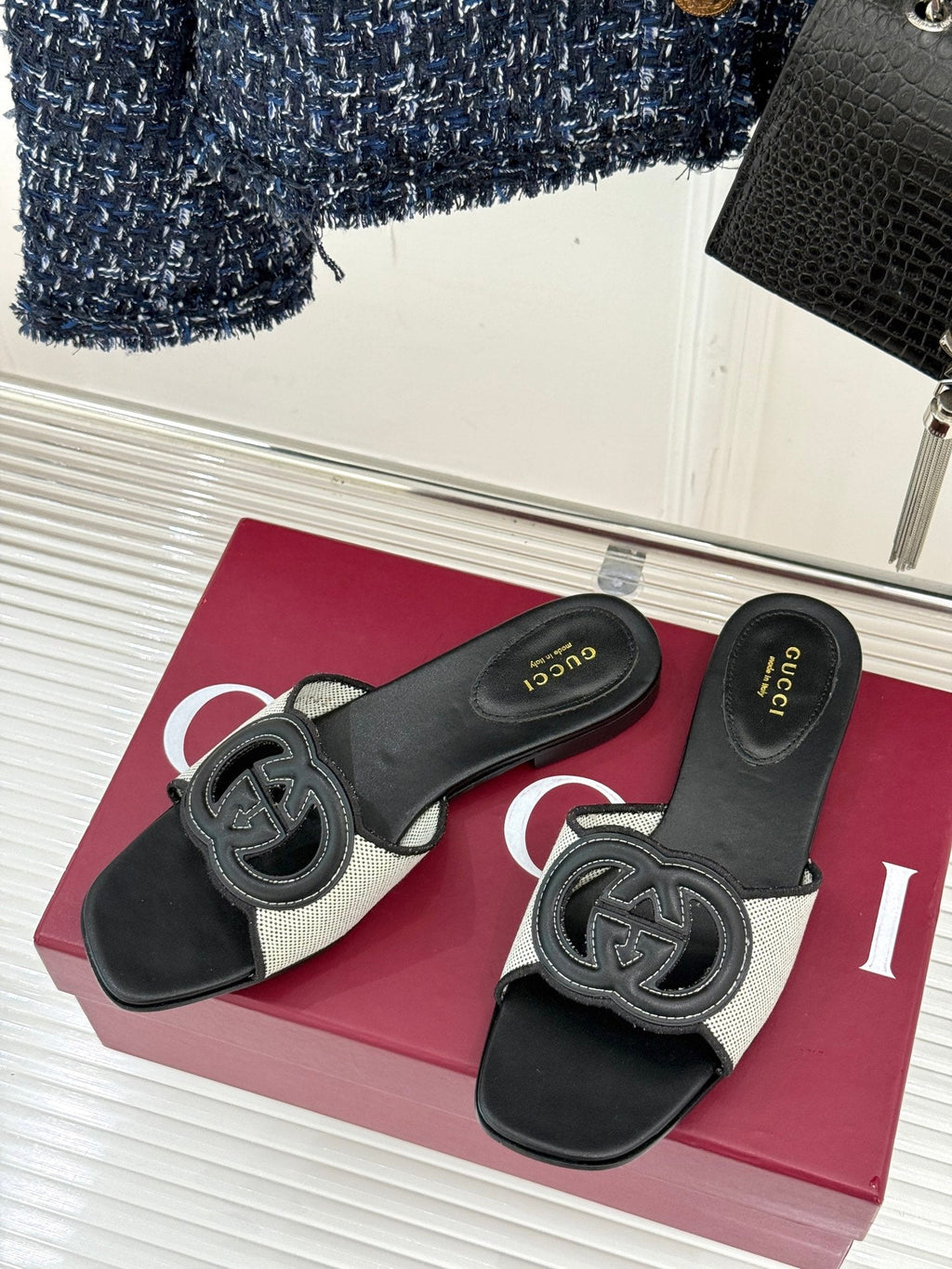 GUCCI SLIDE SANDALS IN BLACK AND WHITE CALFSKIN