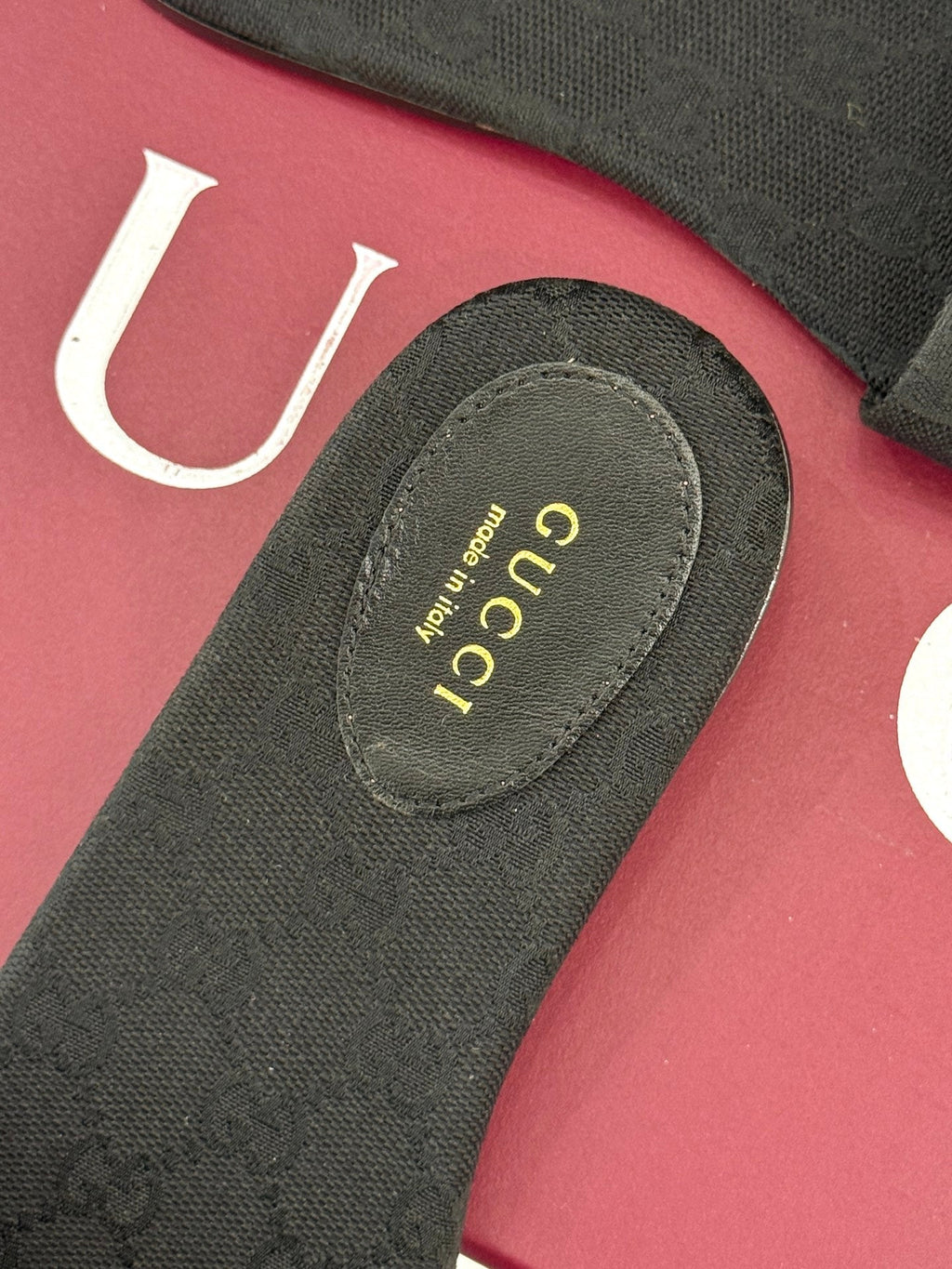 GUCCI SLIDE SANDALS IN BLACK FABRIC EMBOSSED LOGO