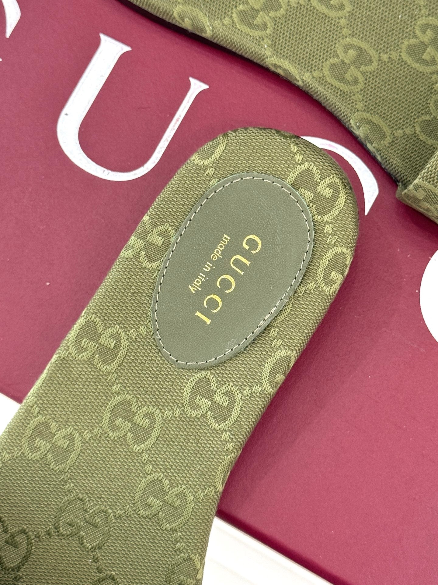 GUCCI SLIDE SANDALS IN MOSS GREEN FABRIC EMBOSSED LOGO