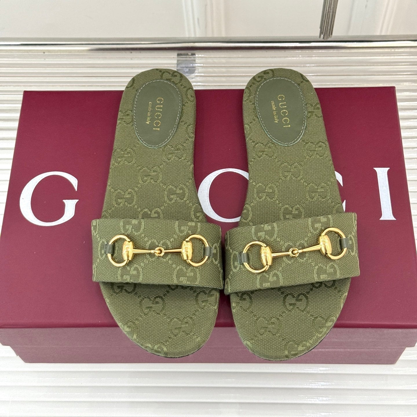 GUCCI SLIDE SANDALS IN MOSS GREEN FABRIC EMBOSSED LOGO
