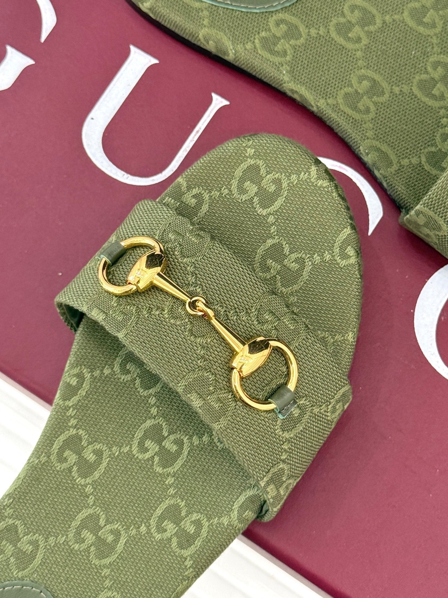 GUCCI SLIDE SANDALS IN MOSS GREEN FABRIC EMBOSSED LOGO