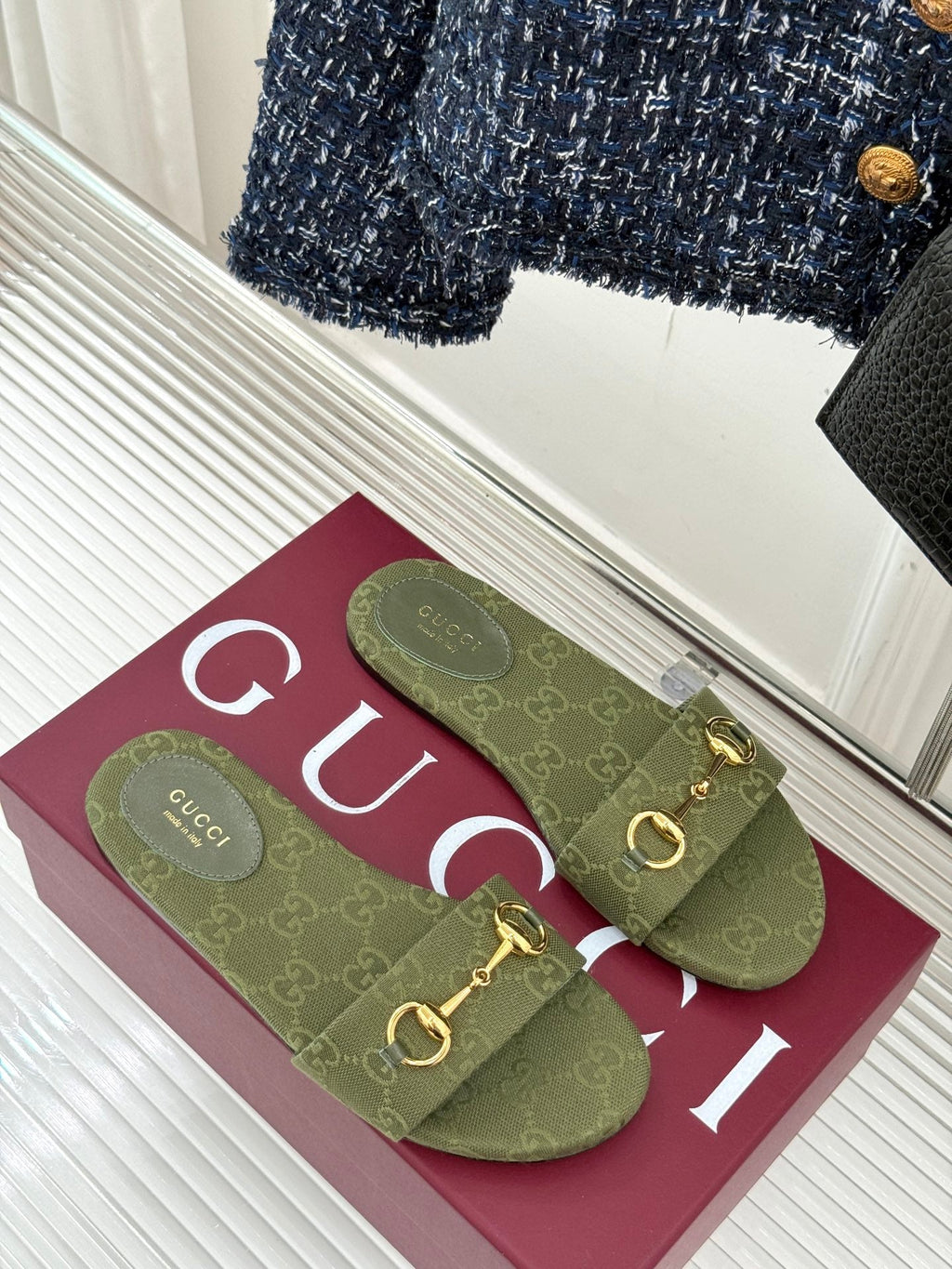 GUCCI SLIDE SANDALS IN MOSS GREEN FABRIC EMBOSSED LOGO