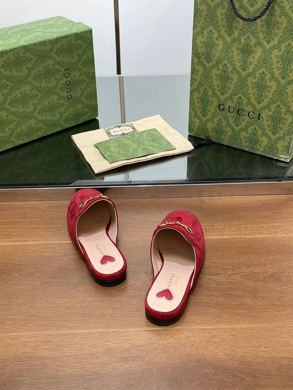 GUCCI HORSEBIT MULE IN CHERRY RED SUEDE WITH GOLD HARDWARE