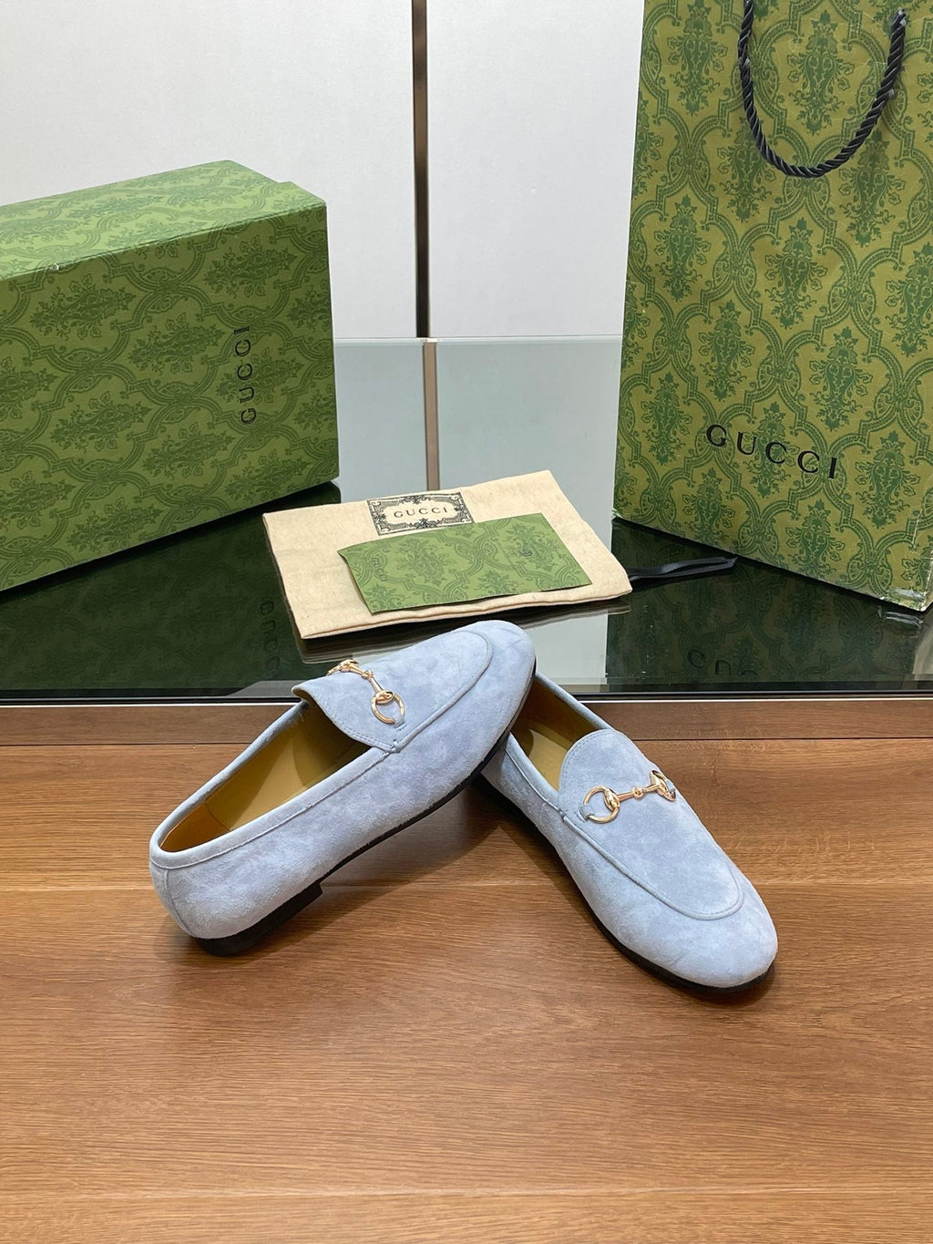 GUCCI HORSEBIT LOAFER IN LIGHT BLUE SUEDE WITH GOLD HARDWARE
