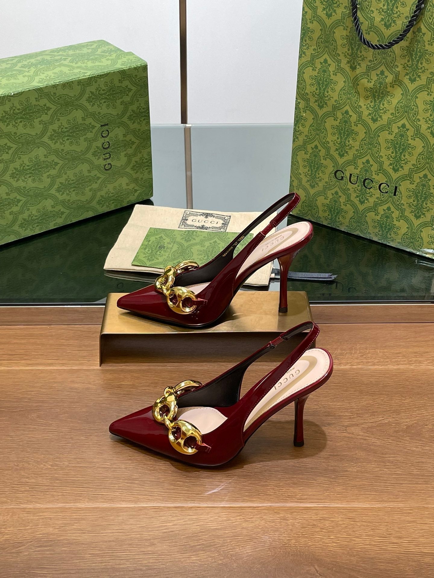 GUCCI HIGH SLINGBACK 10.5 CM IN WINE RED GLOSSY CALFSKIN WITH GOLD HARDWARE