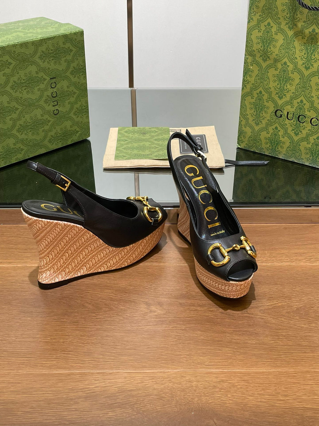 GUCCI WEDGE PLATFORM IN BLACK CALFSKIN WITH GOLD HARDWARE