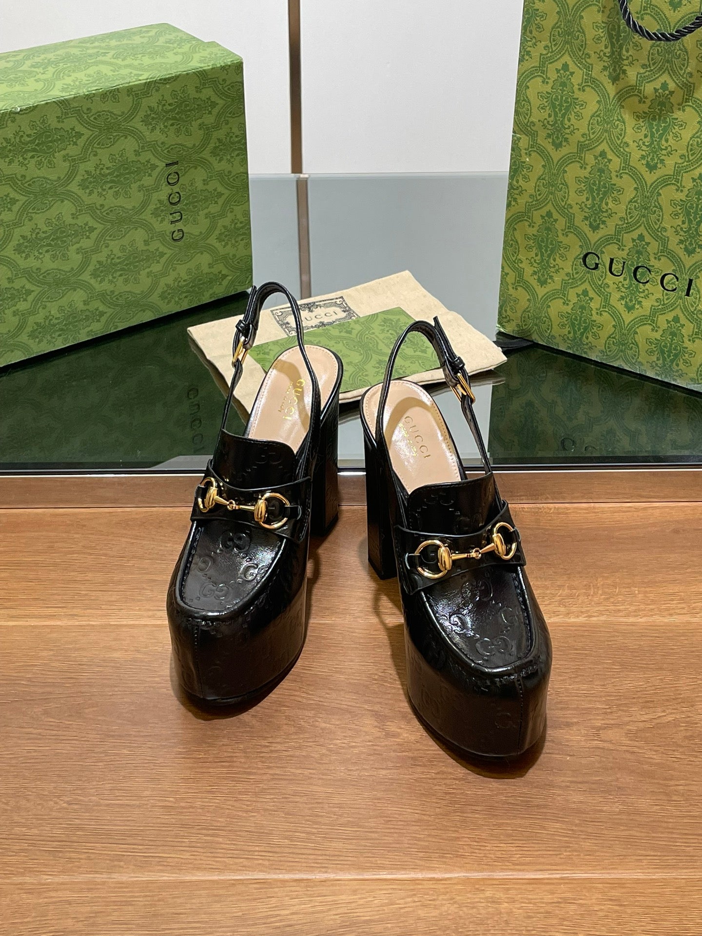GUCCI WOMEN'S HORSEBIT PLATFORM LOAFER SLINGBACK IN BLACK EMBOSSED CALFSKIN