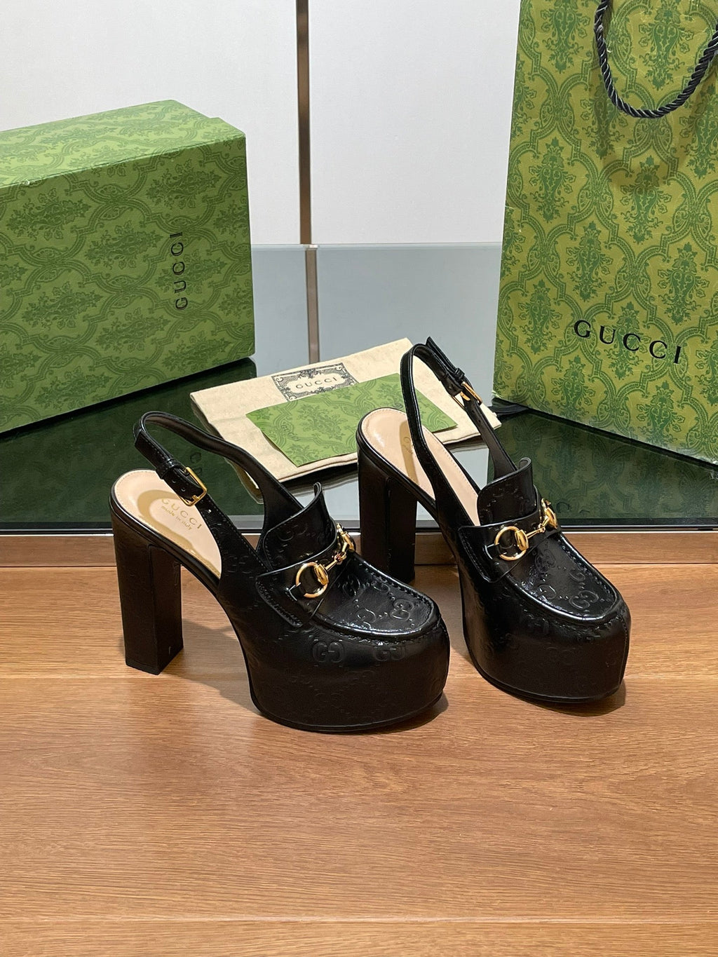 GUCCI WOMEN'S HORSEBIT PLATFORM LOAFER SLINGBACK IN BLACK EMBOSSED CALFSKIN