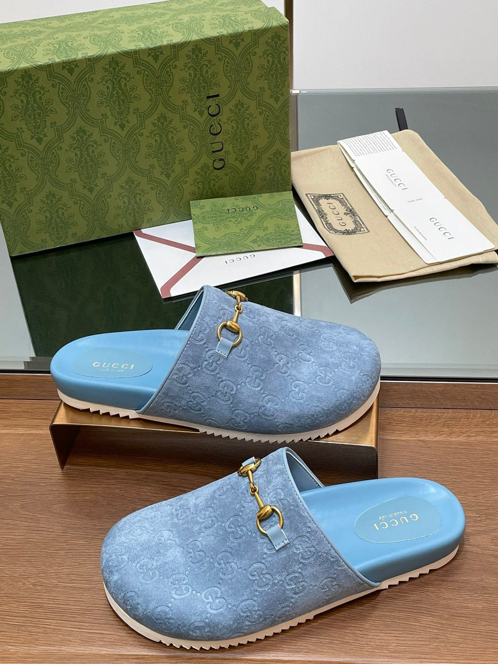 GUCCI HORSEBIT MULE IN LIGHT BLUE EMBOSSED SUEDE AND SHEEPSKIN LINING
