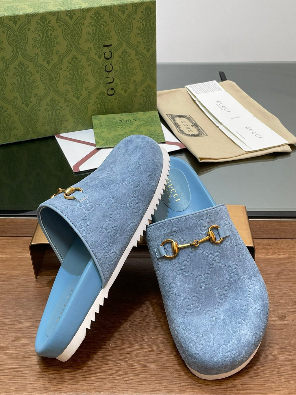 GUCCI HORSEBIT MULE IN LIGHT BLUE EMBOSSED SUEDE AND SHEEPSKIN LINING