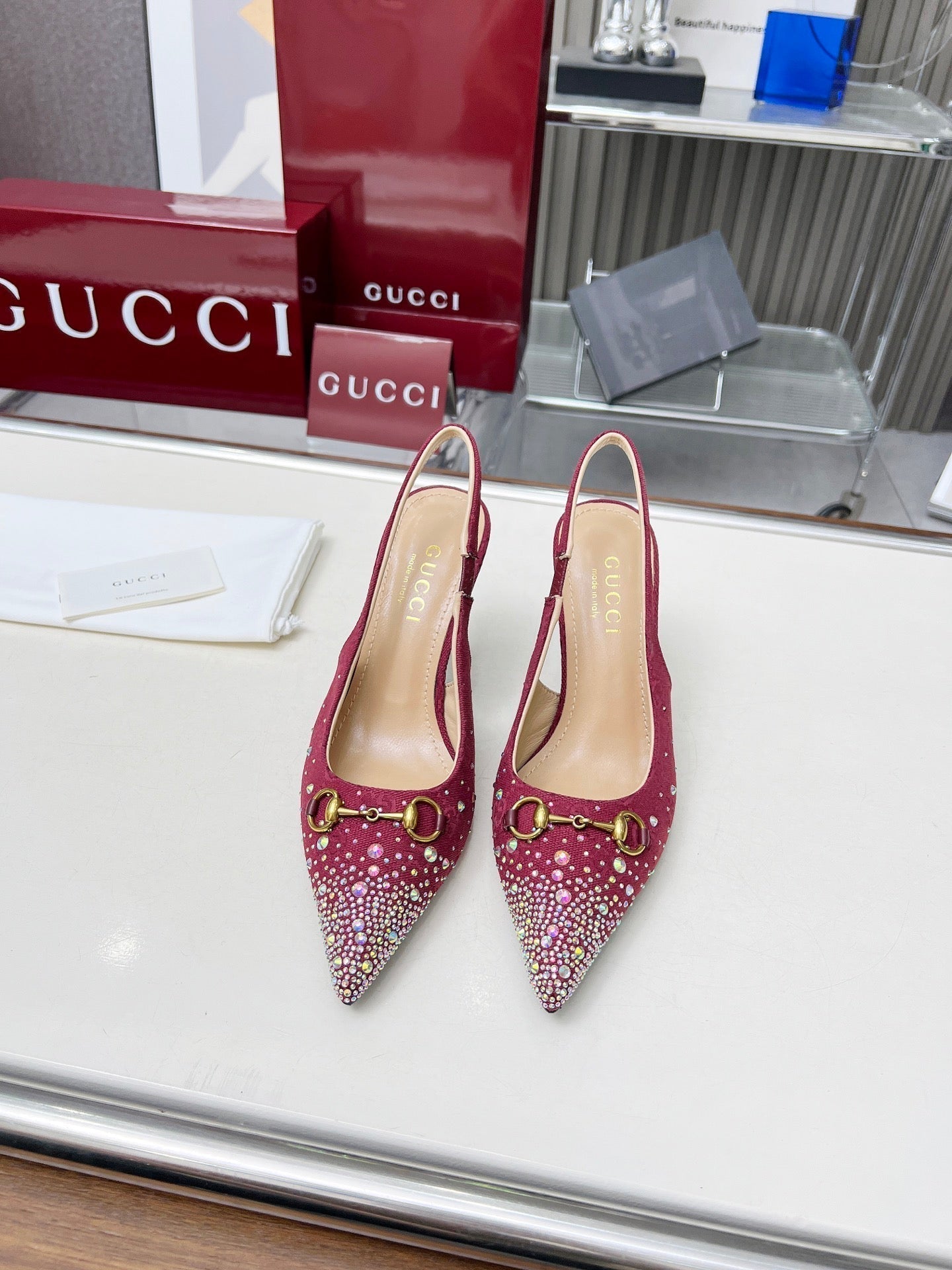 GUCCI HORSEBIT SLINGBACKS IN CHERRY RED MONOGRAM FABRIC WITH CRYSTALS