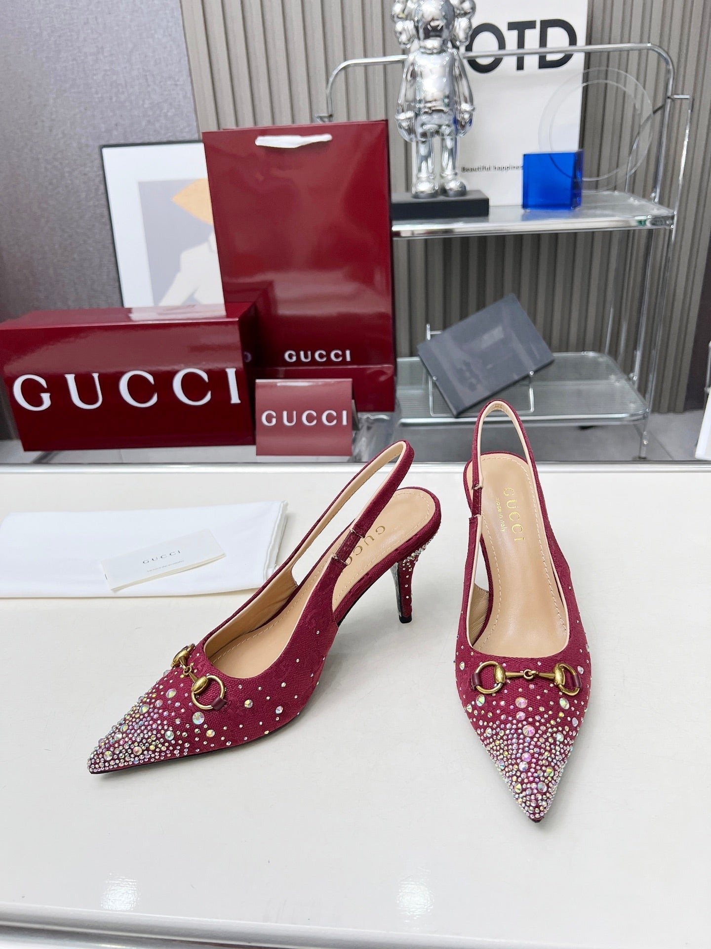 GUCCI HORSEBIT SLINGBACKS IN CHERRY RED MONOGRAM FABRIC WITH CRYSTALS