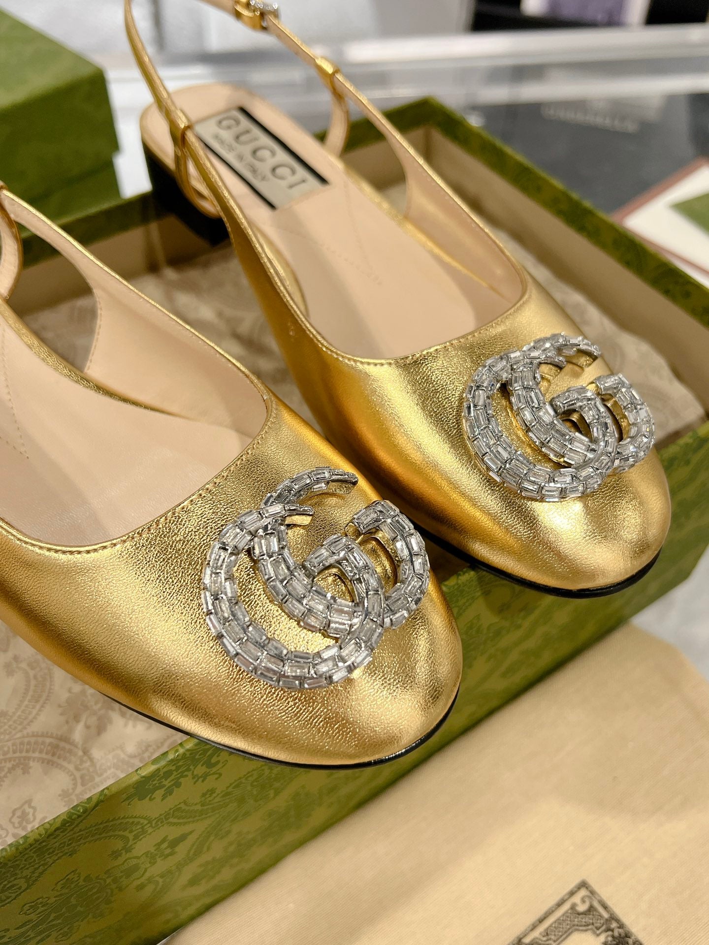 GUCCI METALIC SLINGBACK FLATS IN GOLD CALFSKIN