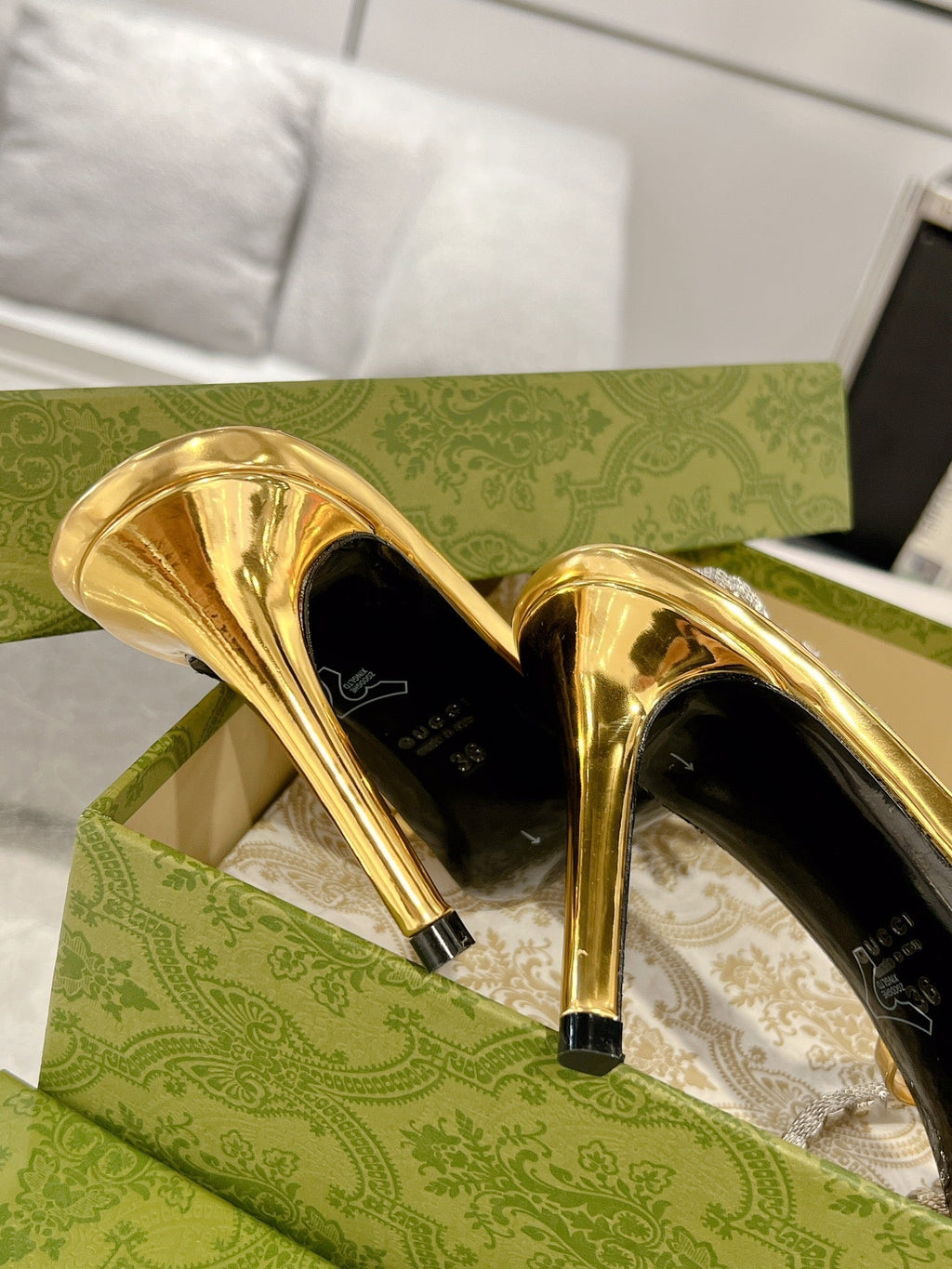 GUCCI STRAPPY SANDAL WITH RHINESTONE CHAIN IN GOLD PATENT LEATHER