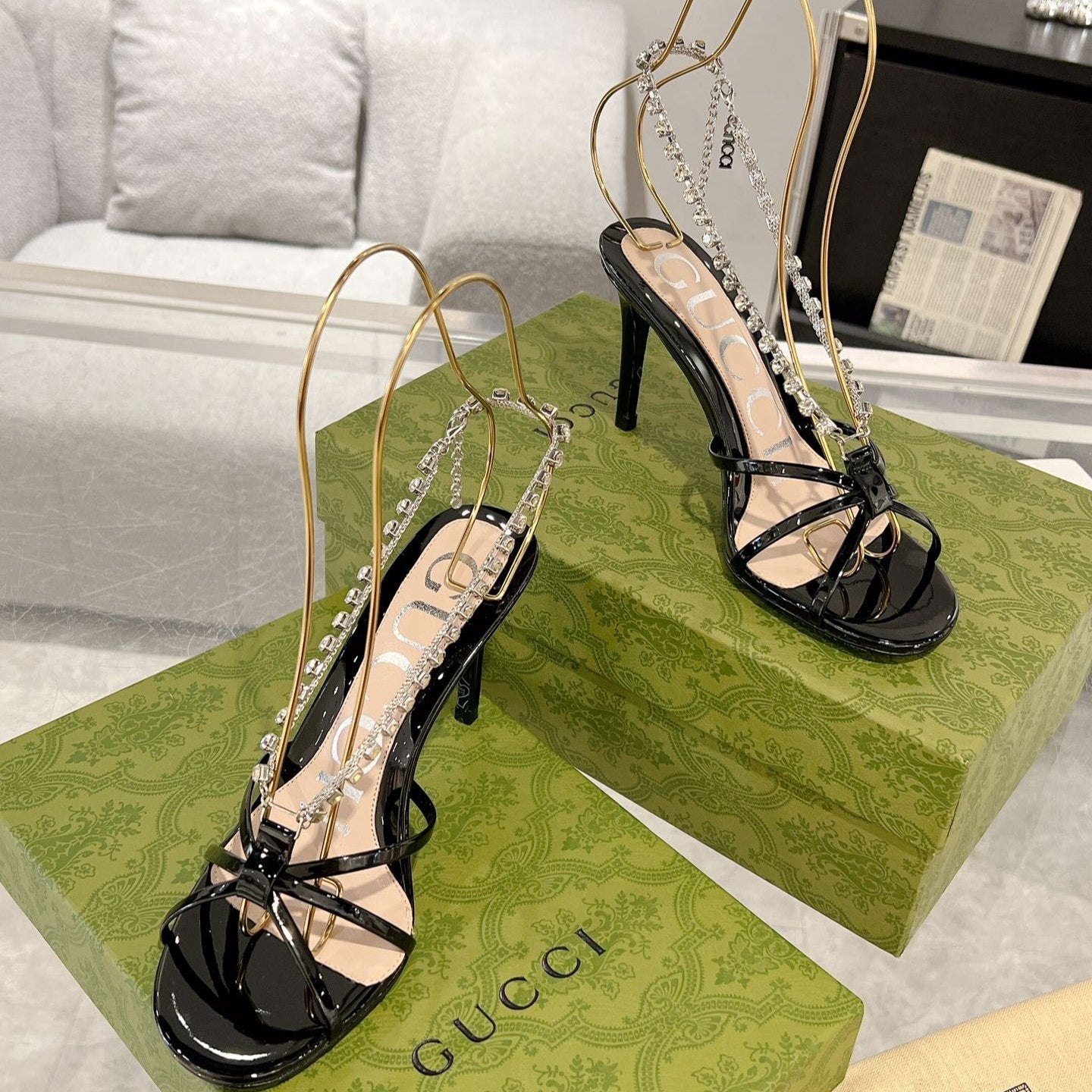 GUCCI STRAPPY SANDAL WITH RHINESTONE CHAIN IN BLACK PATENT LEATHER