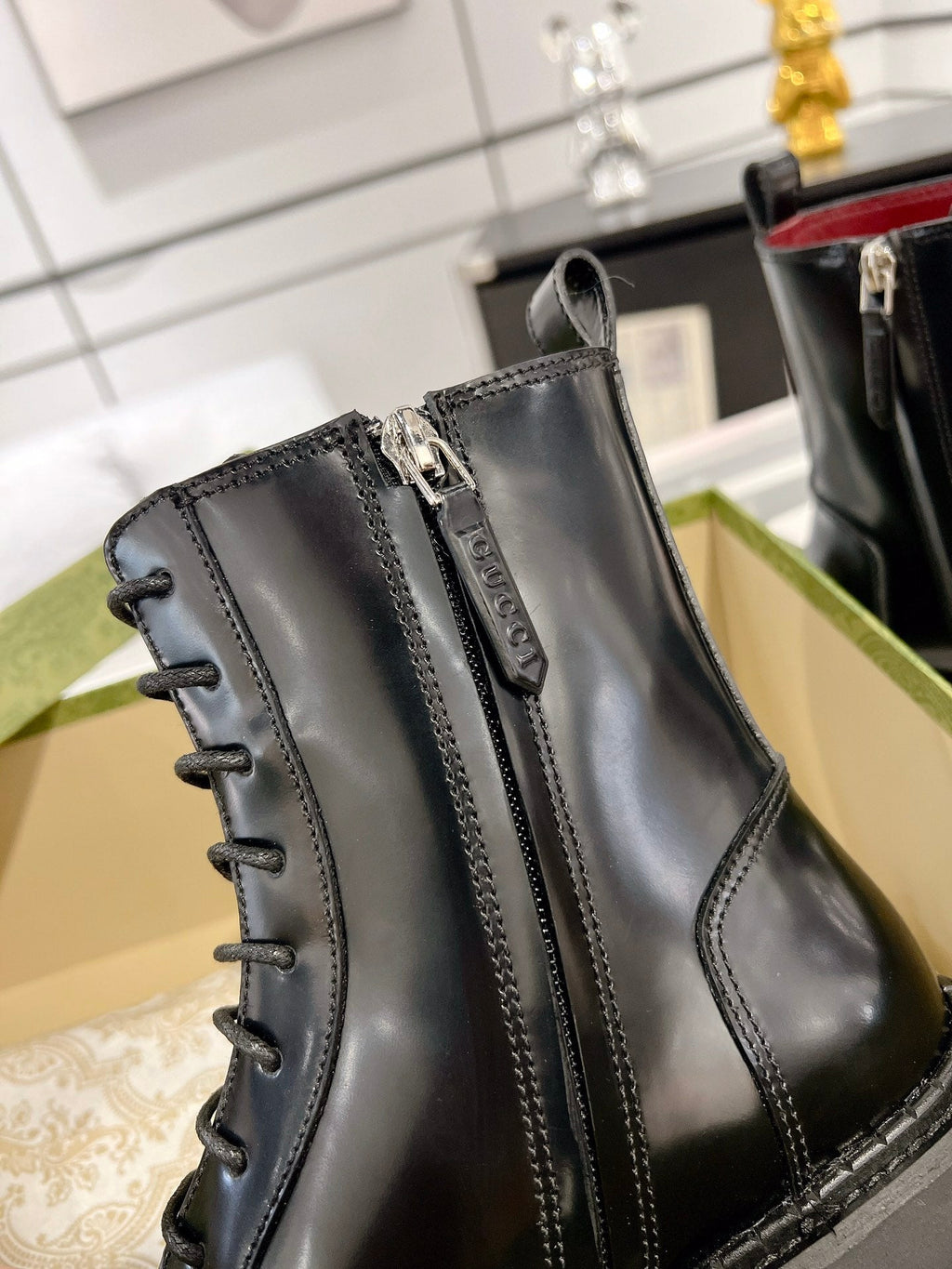 GUCCI WEB ANKLE BOOTS IN BLACK CALFSKIN