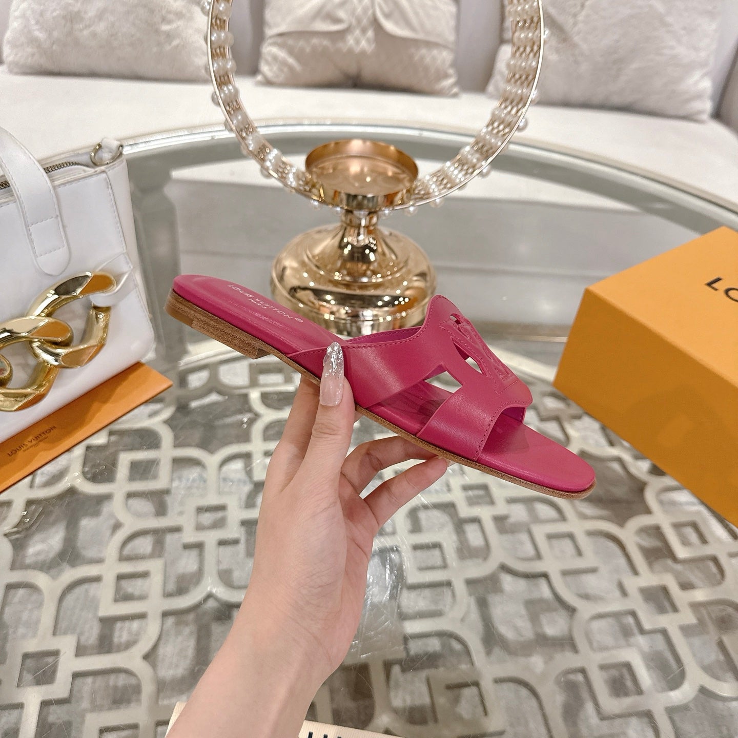 LOUIS VUITTON ISOLA FLAT SLIDE IN DARK PINK CALFSKIN