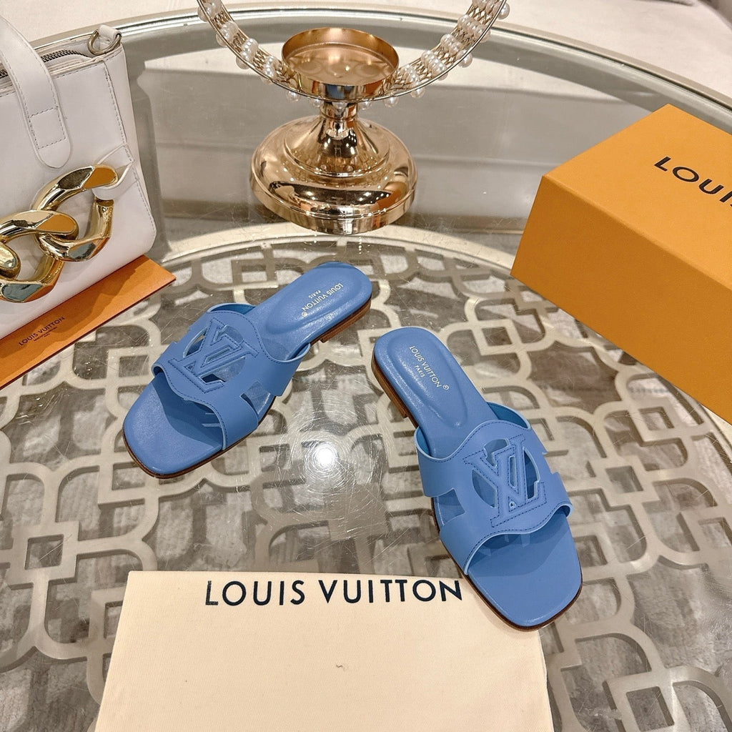 LOUIS VUITTON ISOLA FLAT SLIDE IN CORNFLOWER BLUE CALFSKIN