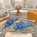 LOUIS VUITTON ISOLA FLAT SLIDE IN CORNFLOWER BLUE CALFSKIN