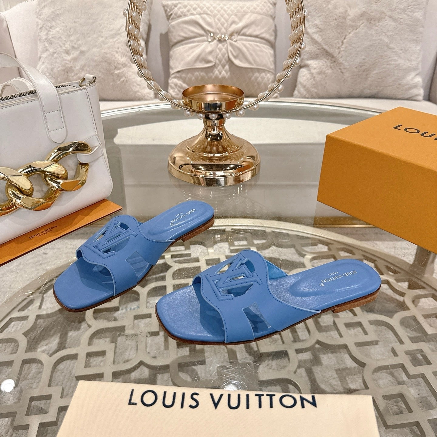 LOUIS VUITTON ISOLA FLAT SLIDE IN CORNFLOWER BLUE CALFSKIN