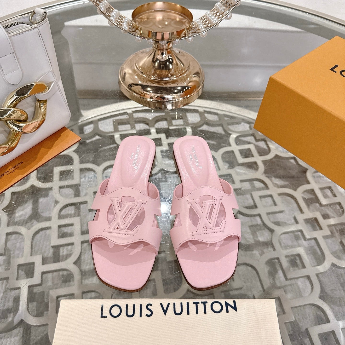 LOUIS VUITTON ISOLA FLAT SLIDE IN PASTEL PINK CALFSKIN