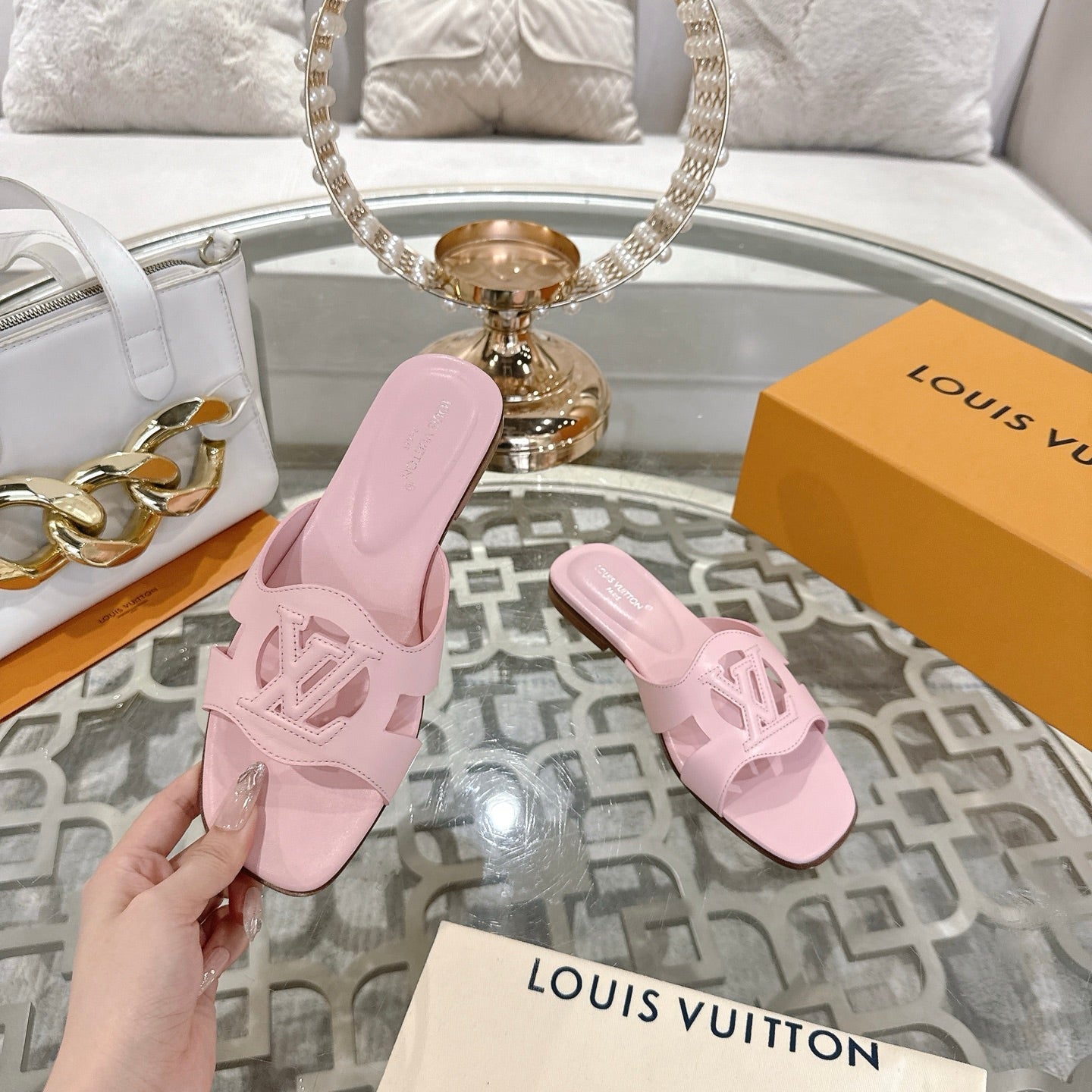 LOUIS VUITTON ISOLA FLAT SLIDE IN PASTEL PINK CALFSKIN