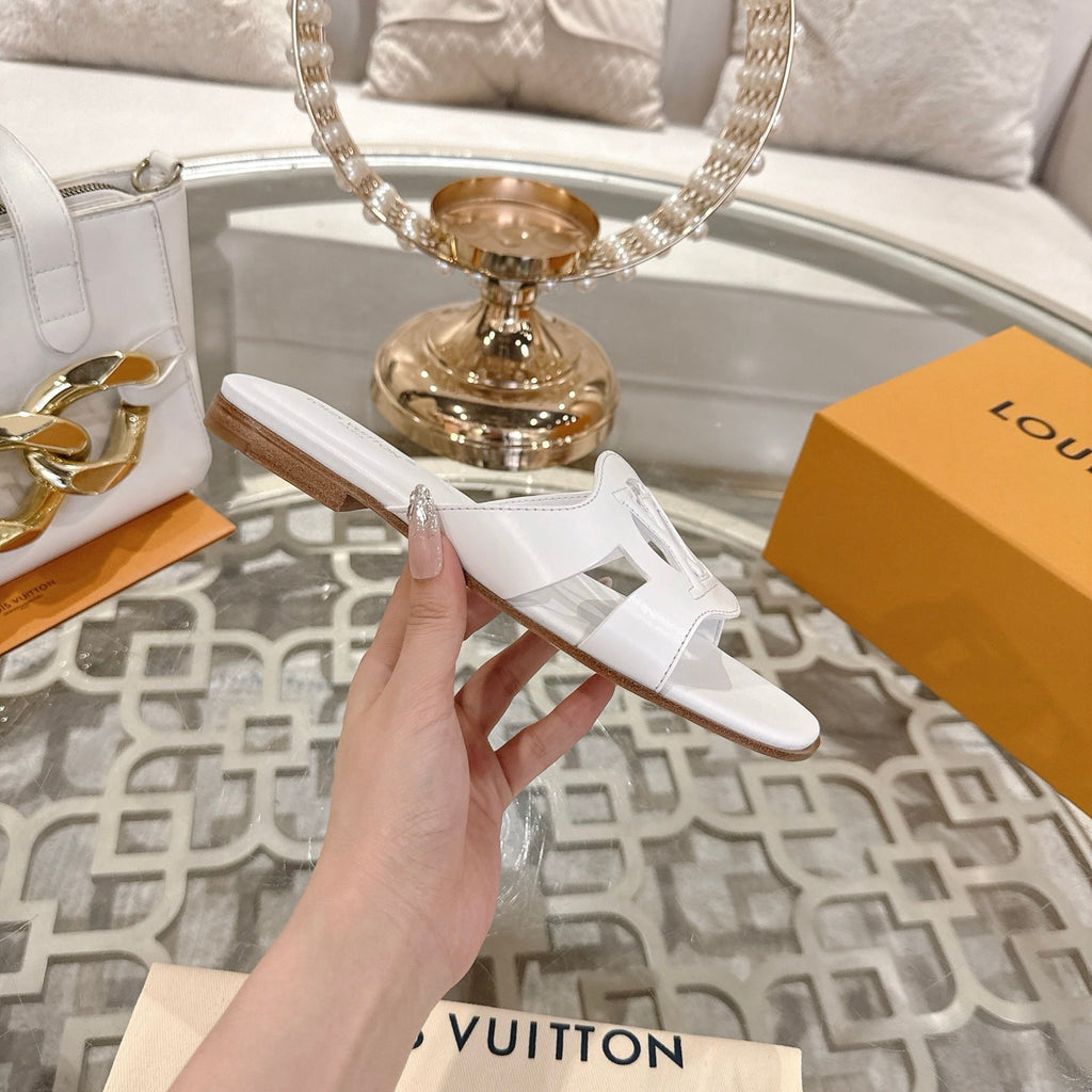 LOUIS VUITTON ISOLA FLAT SLIDE IN WHITE CALFSKIN