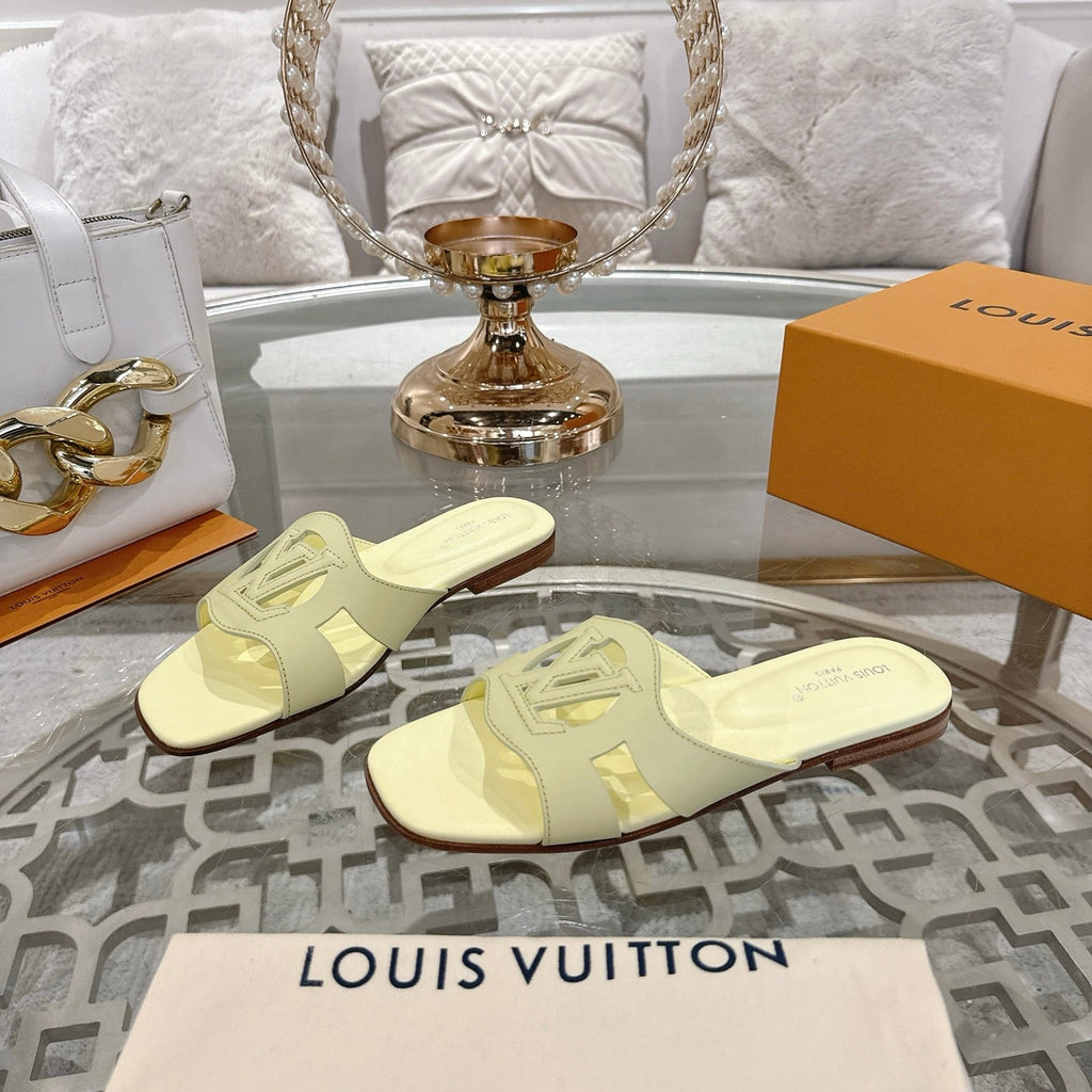 LOUIS VUITTON ISOLA FLAT SLIDE IN PALE YELLOW CALFSKIN