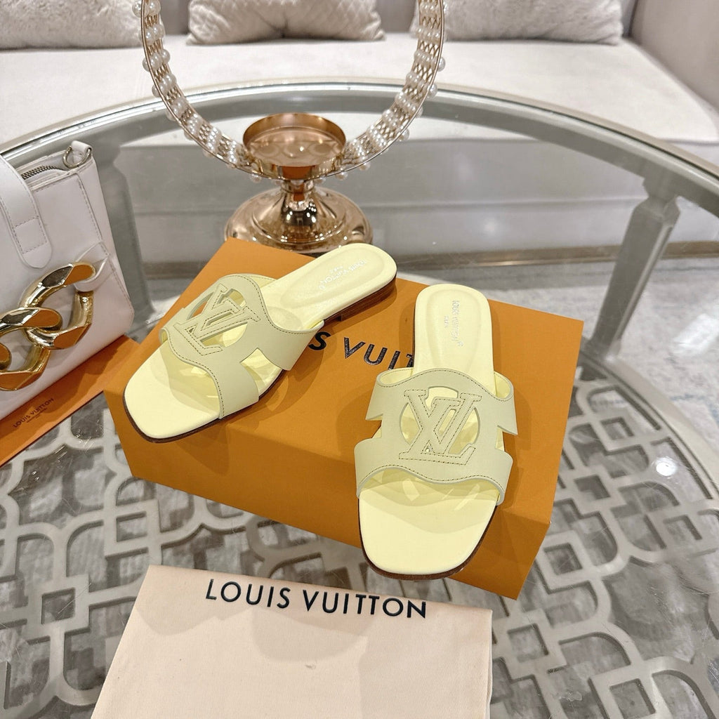 LOUIS VUITTON ISOLA FLAT SLIDE IN PALE YELLOW CALFSKIN