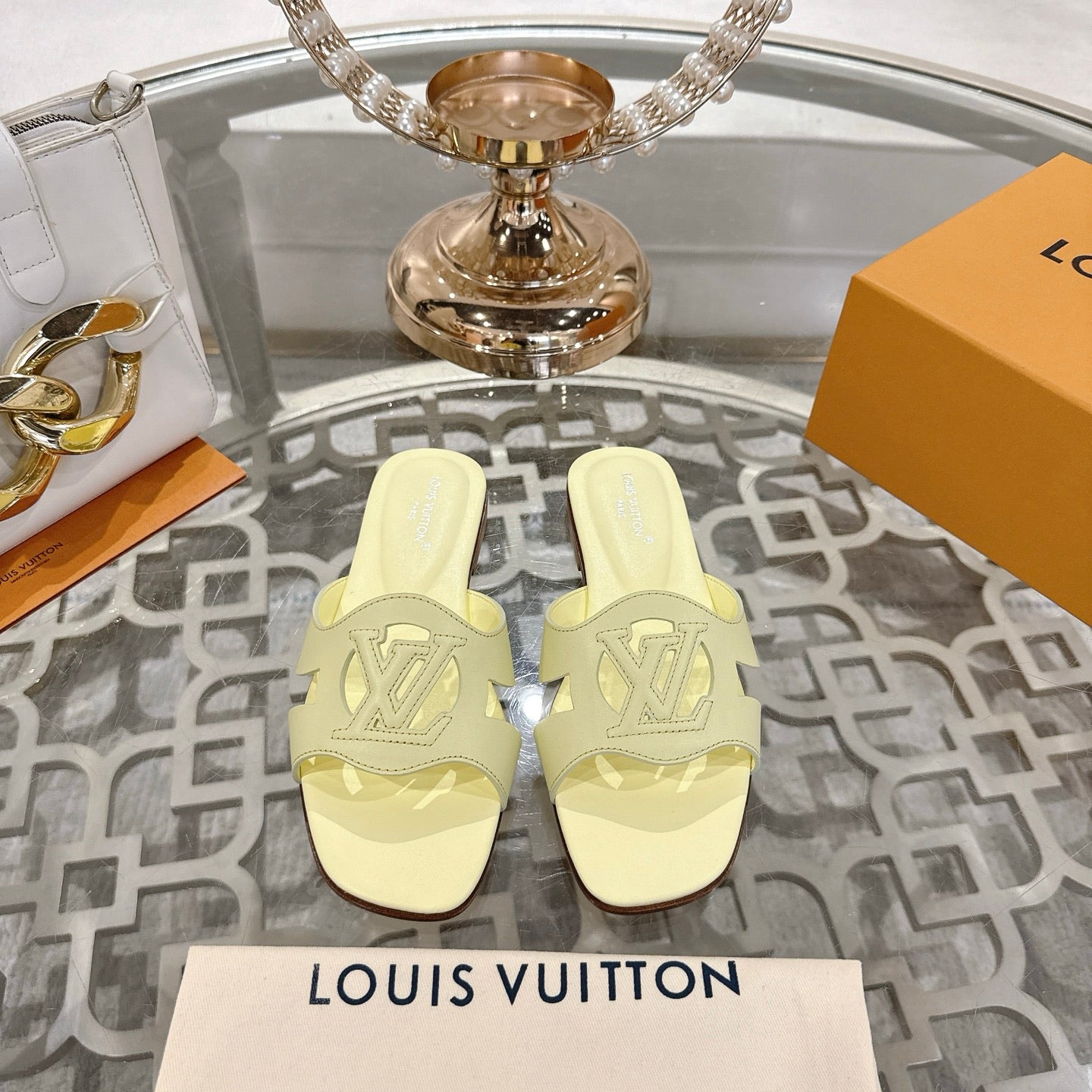 LOUIS VUITTON ISOLA FLAT SLIDE IN PALE YELLOW CALFSKIN