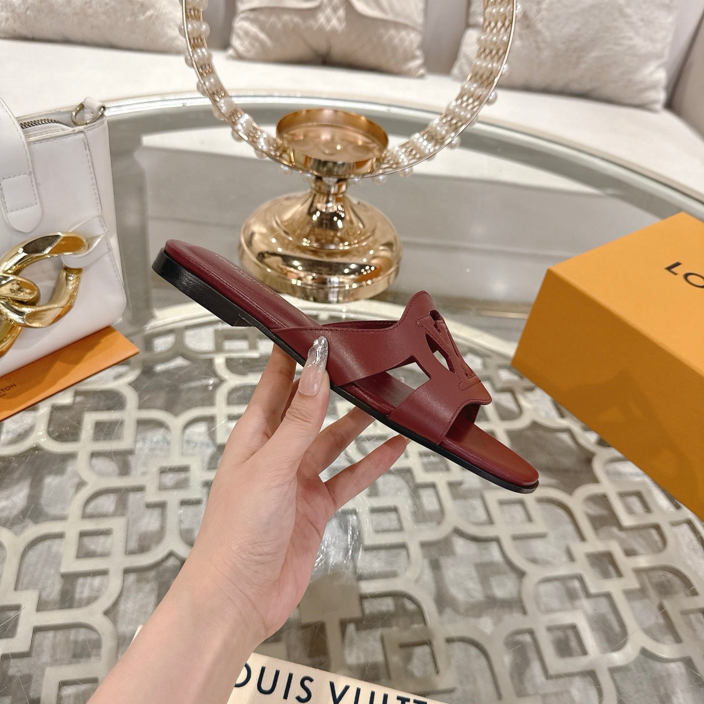 LOUIS VUITTON ISOLA FLAT SLIDE IN JAM RED CALFSKIN