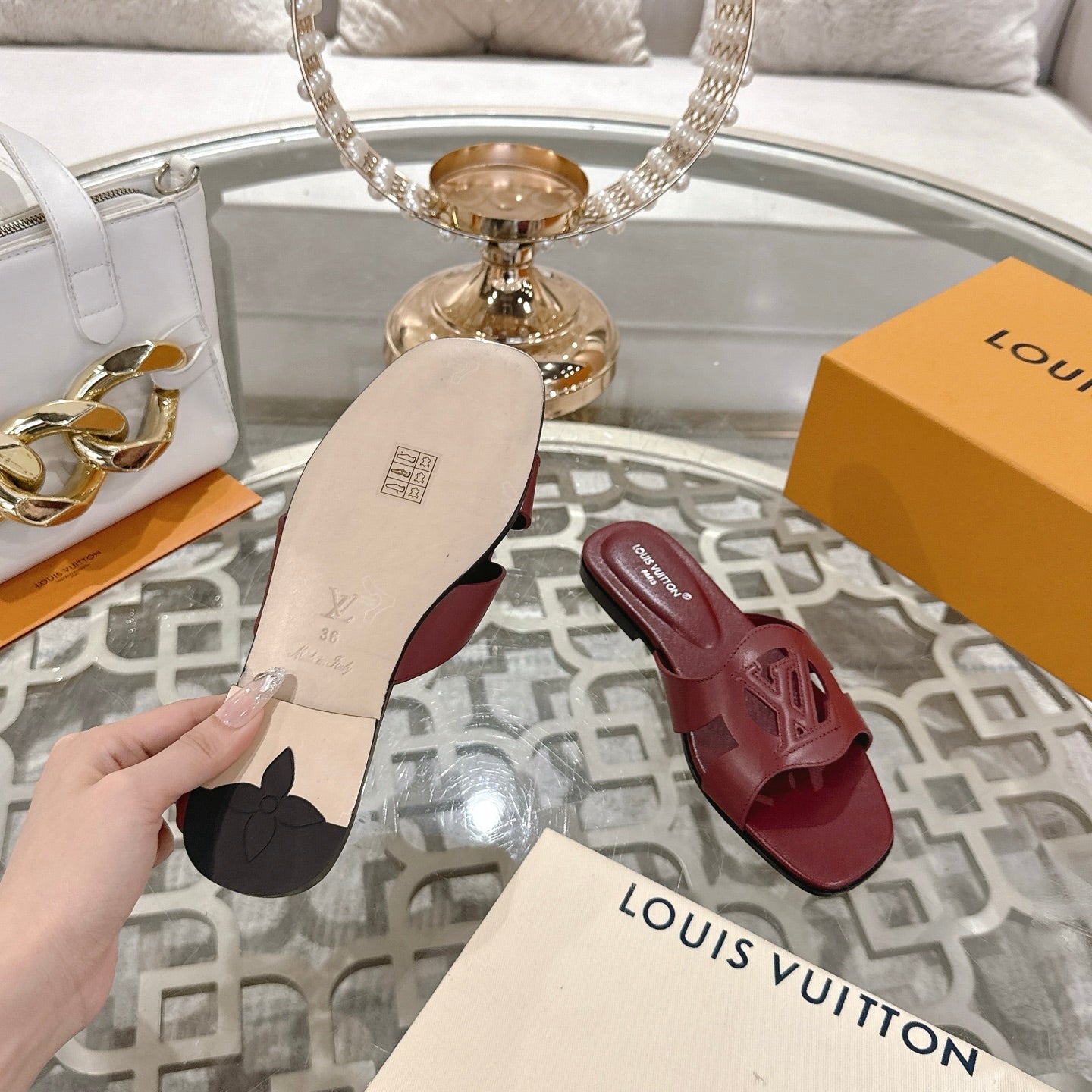 LOUIS VUITTON ISOLA FLAT SLIDE IN JAM RED CALFSKIN